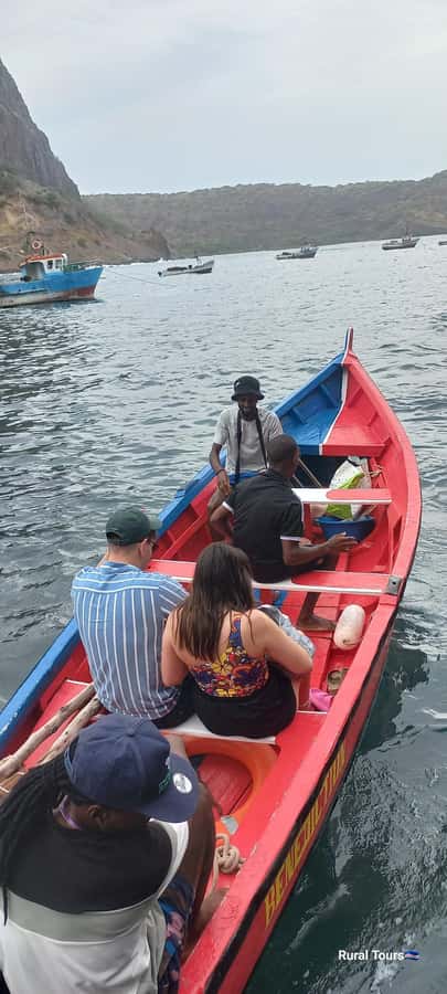 Boat Trip to Aguas Belas Cave+Barbecue - Boarding the colorful fishing boat
