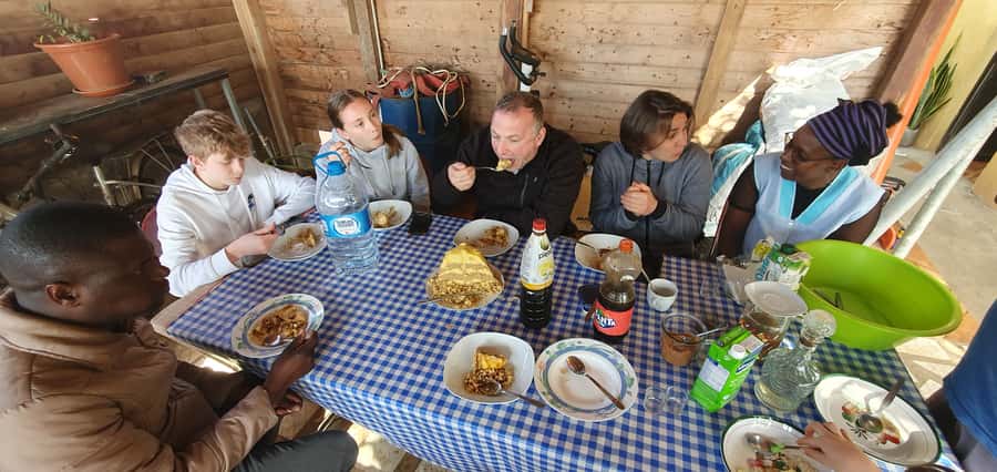 Day with locals people - Making Santiago couscous on a three-stone stove