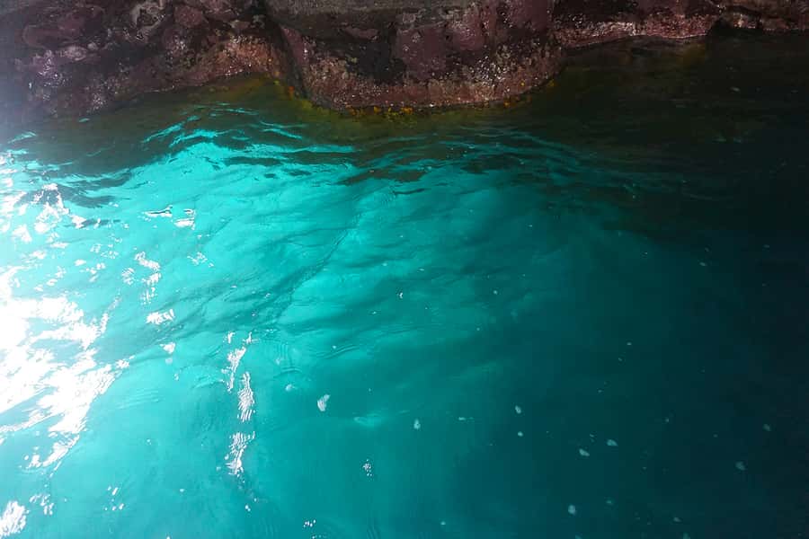 From Praia: Boat Trip, Snorkeling, Cave & BBQ on the Beach - Swimming inside Águas Belas cave