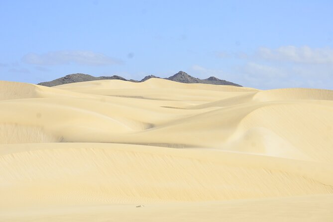 Half Day 4x4 Trip - Dunes, Caves, Santa Monica Beach & Village - Rolling across Deserto de Viana